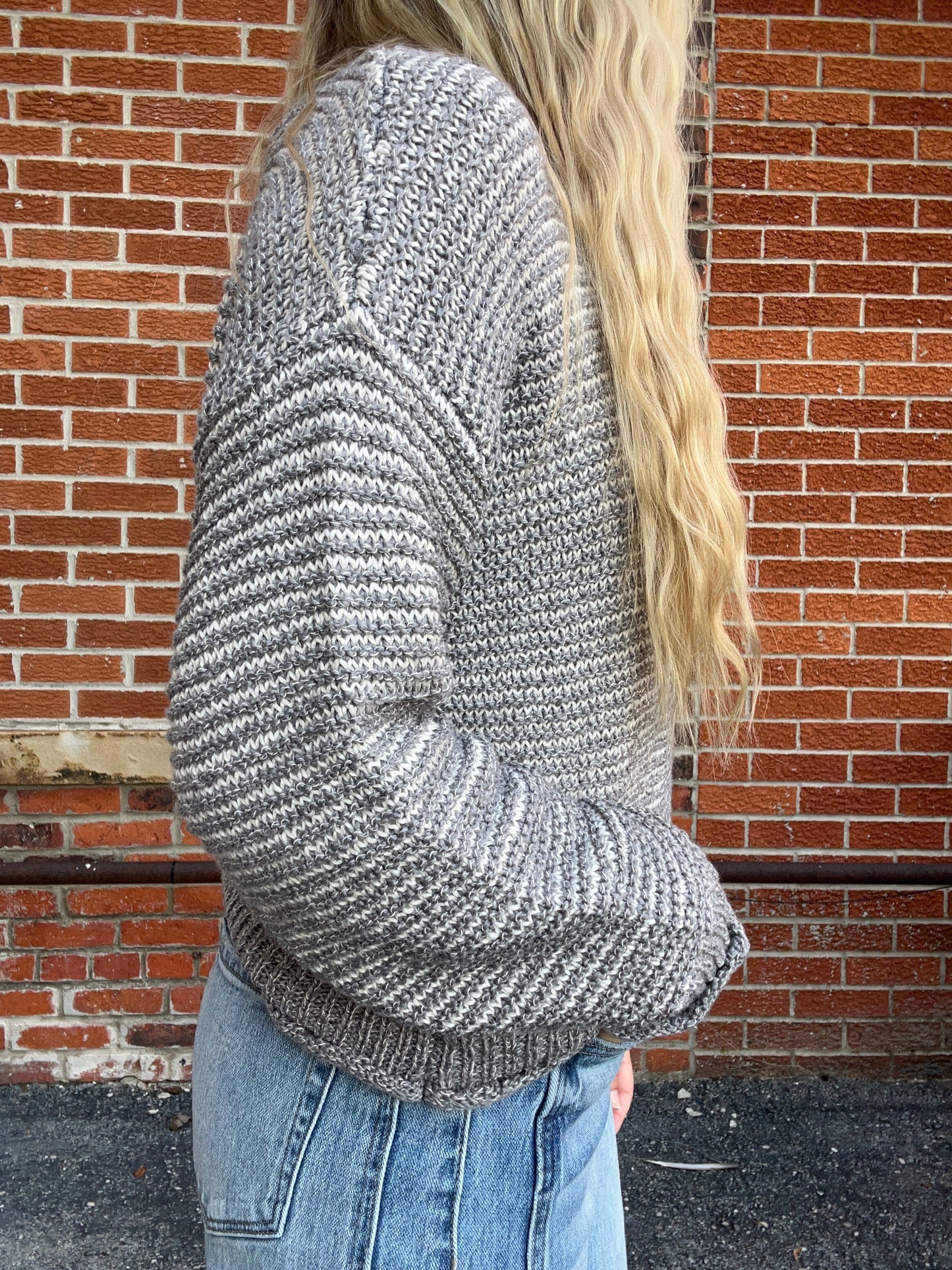 The Quincey Striped Raw Edge Long Sleeve Knit Sweater