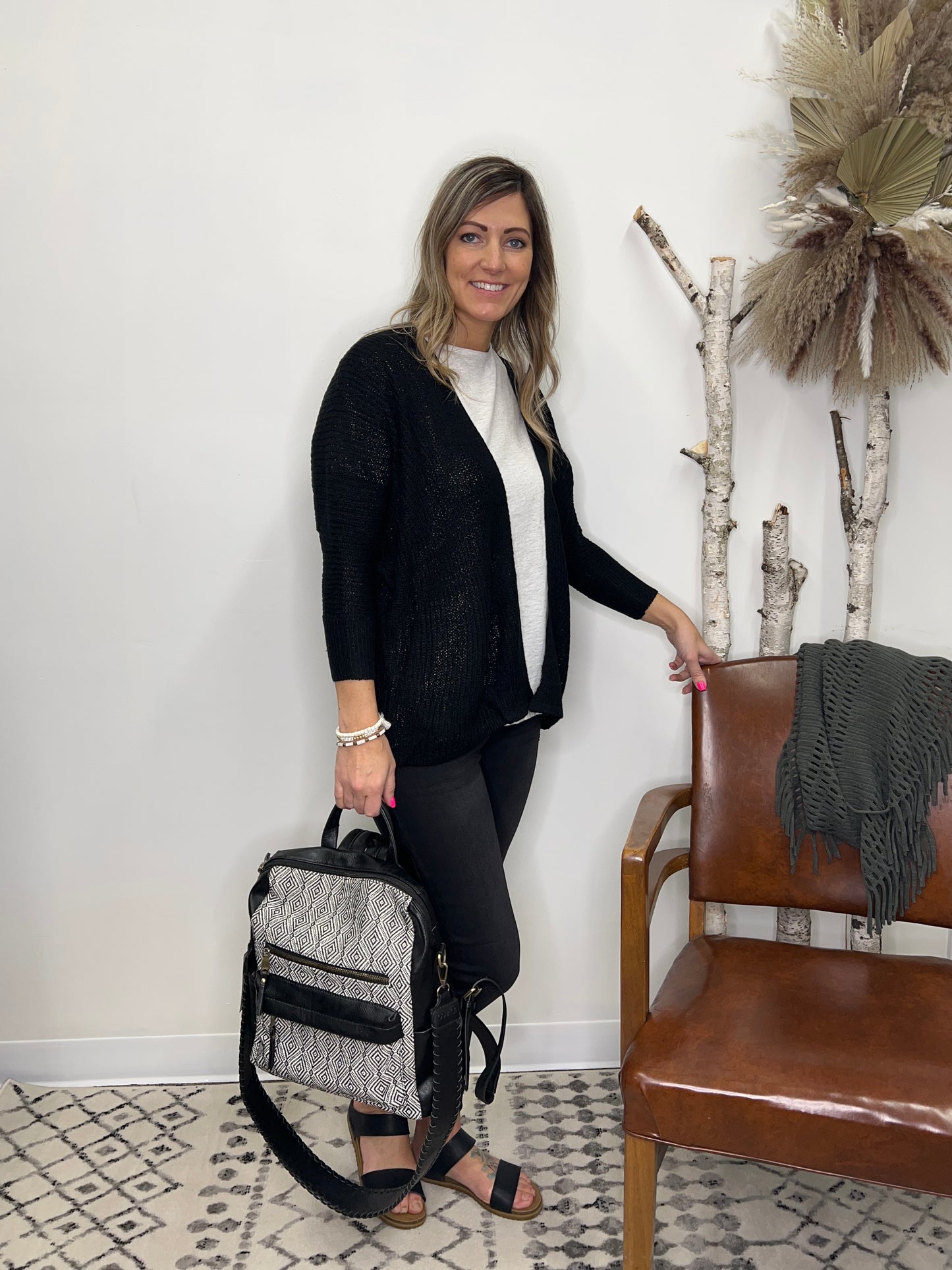 The Kaci Mid Rise Black Label Skinny Jeans