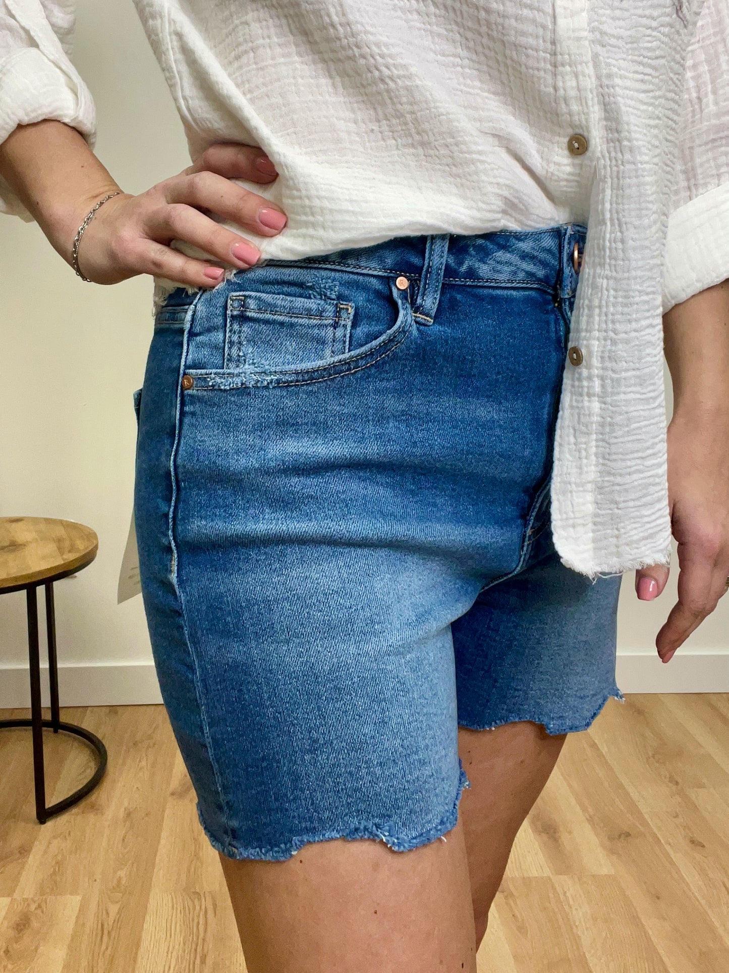 The Nimah RISEN High Rise Raw Hem Shorts
