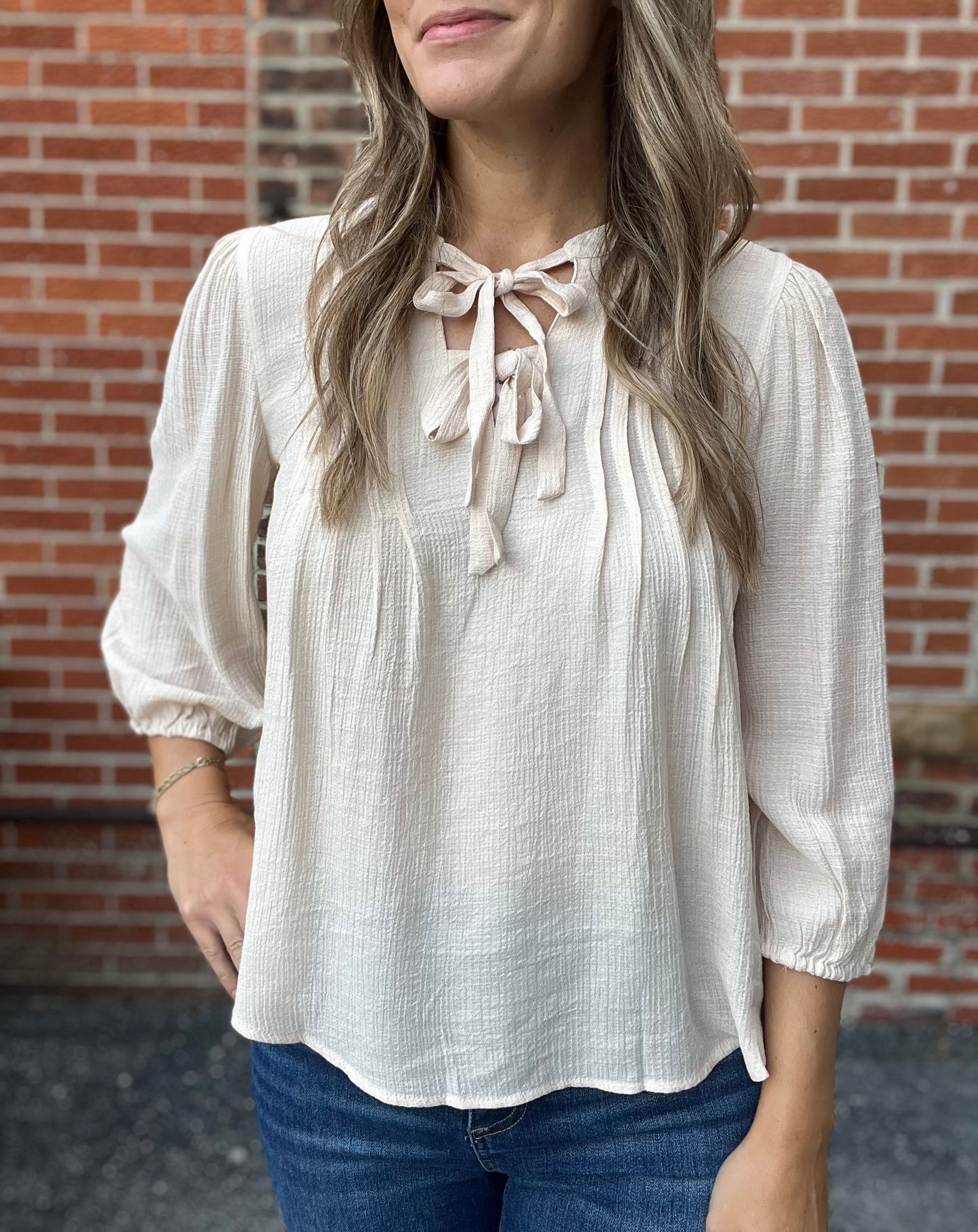The Swayer Front Tie Pleated Top