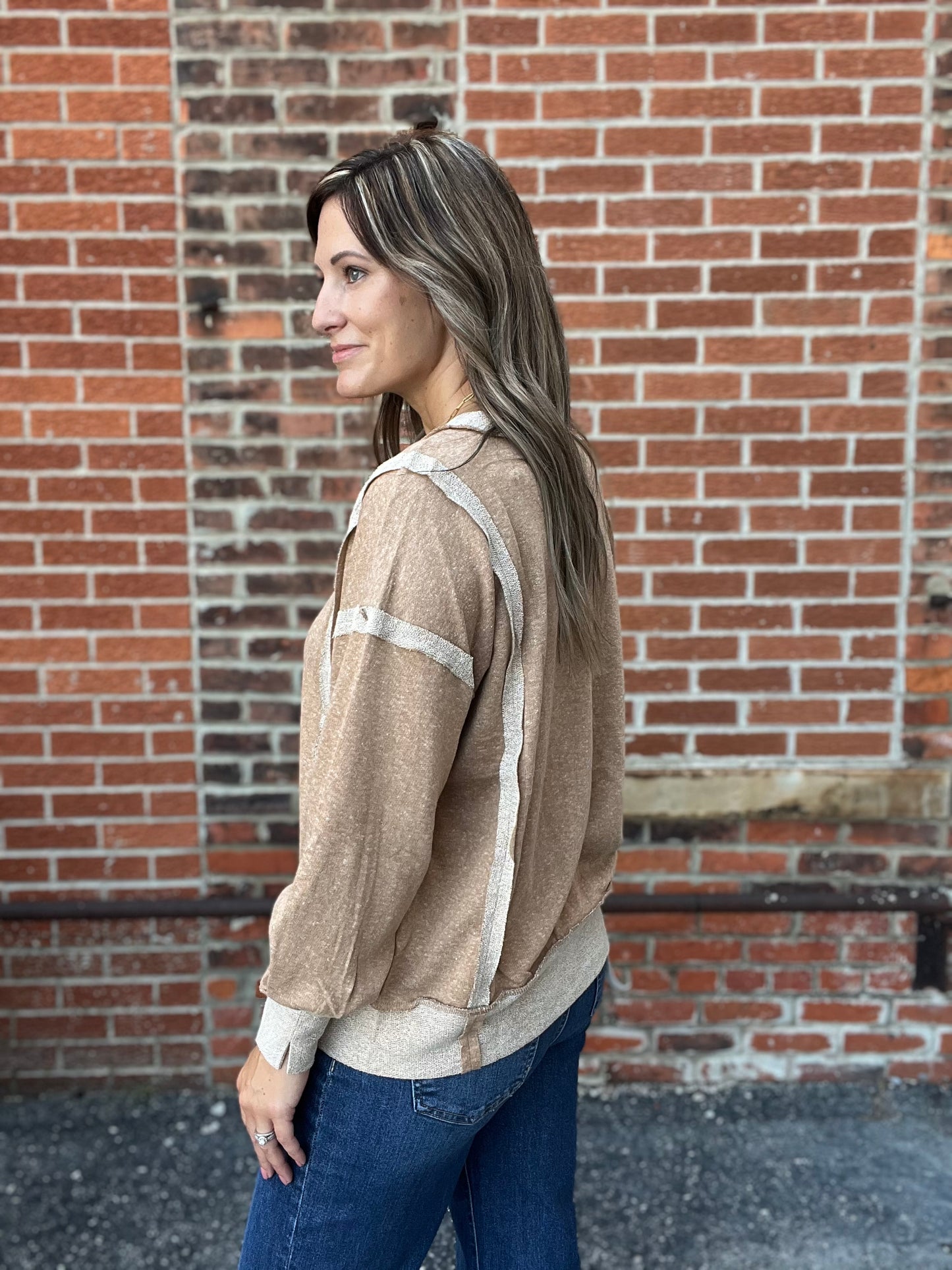 The Megara Exposed Seam long Sleeve Top