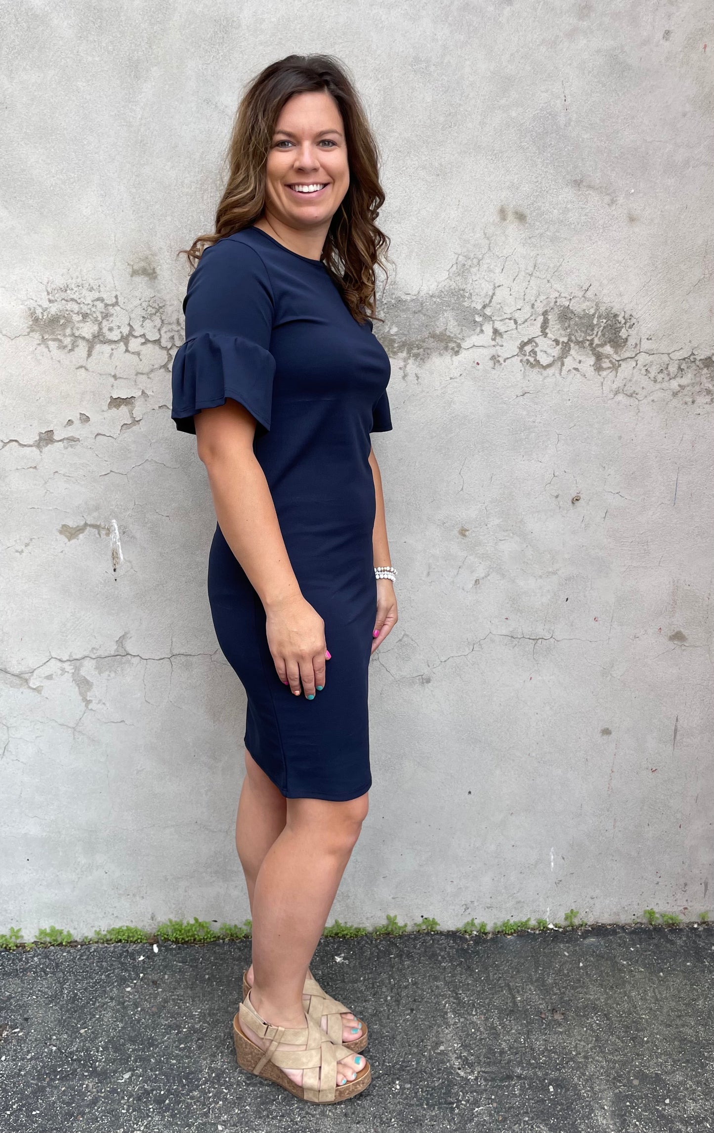 The Rinley Navy Ruffle Sleeve Dress