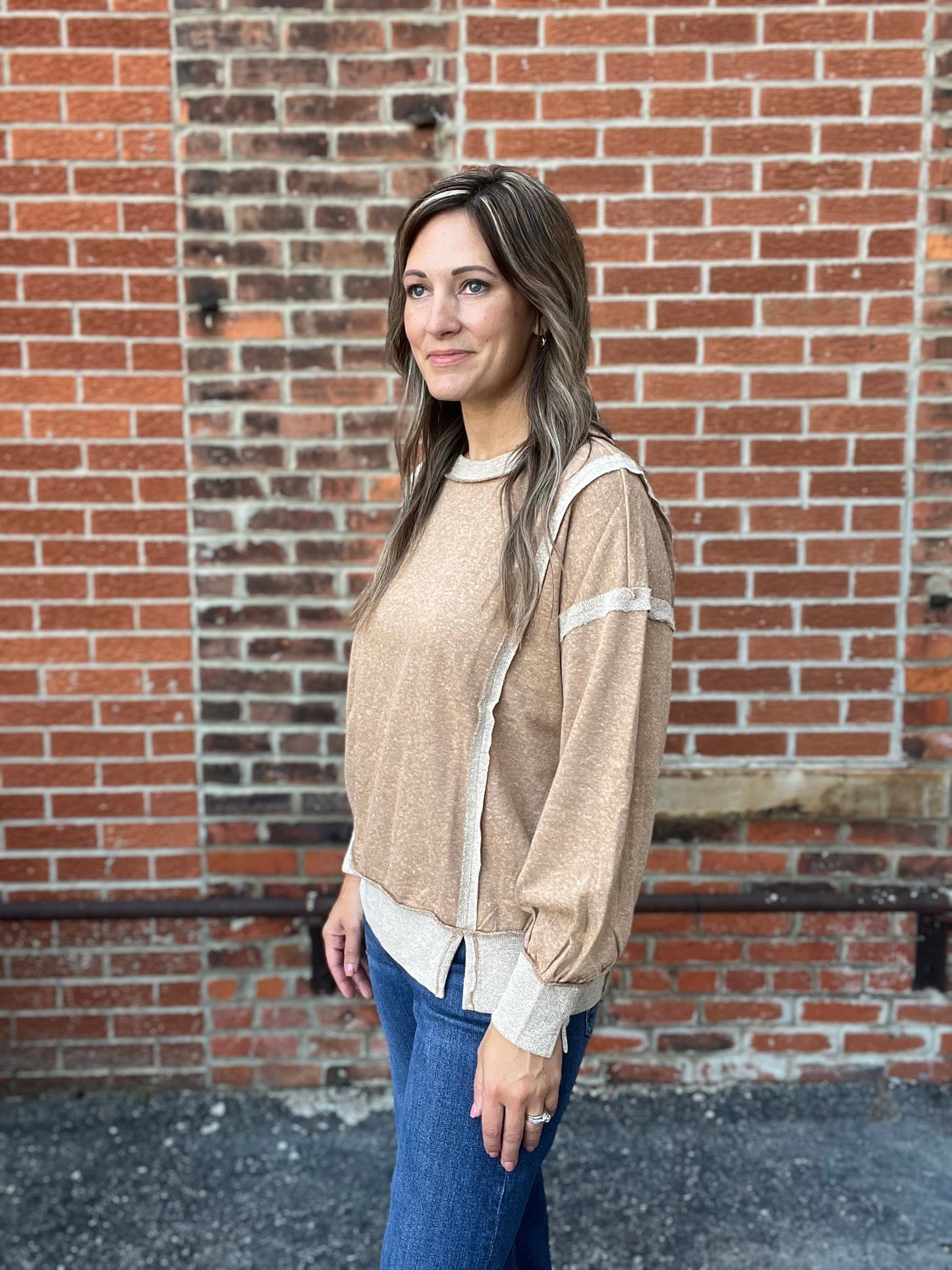 The Megara Exposed Seam long Sleeve Top