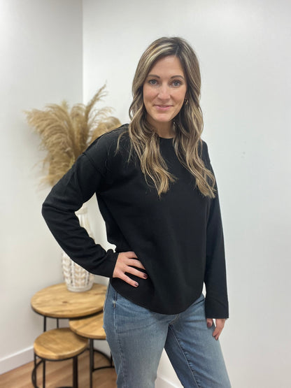 The Laurel Black Reverse Seam Crewneck