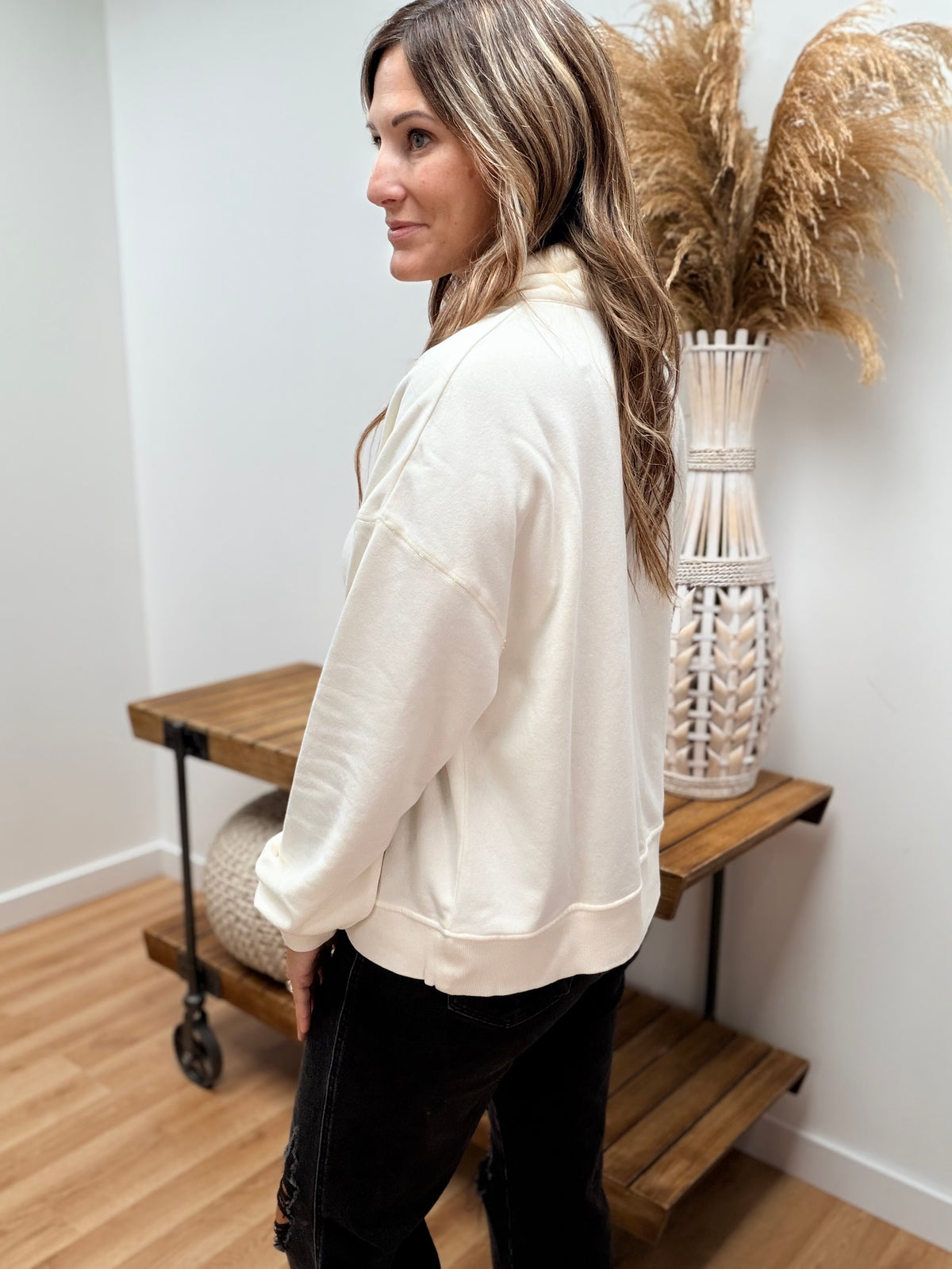 The Loloi Quarter Button Crewneck Sweatshirt