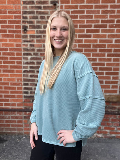 The Soren Dusty Blue Exposed Seam Knit Top