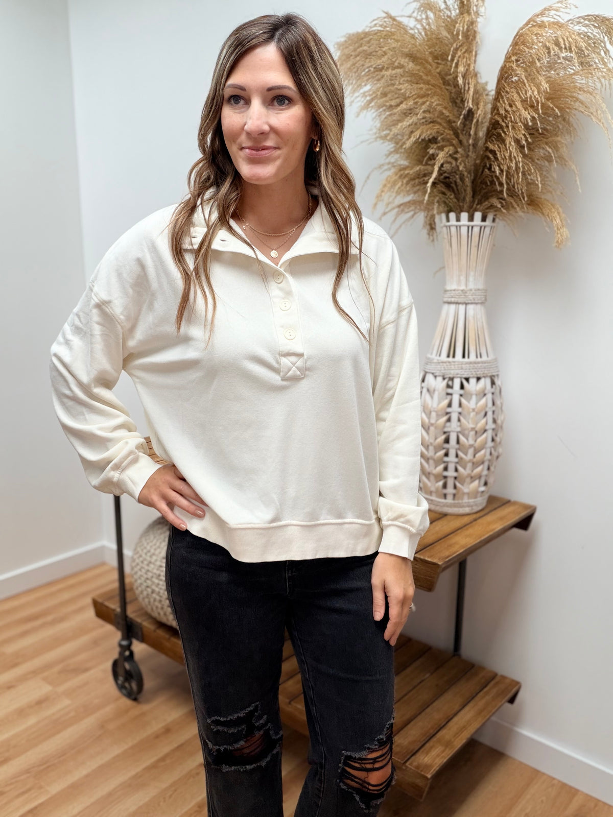 The Loloi Quarter Button Crewneck Sweatshirt