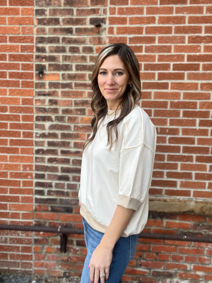 The Sable Cream Contrast Stitch Raglan top