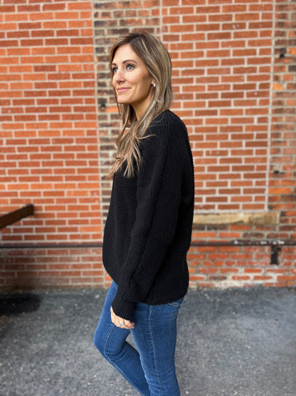 The Classic Black Button Back Sweater