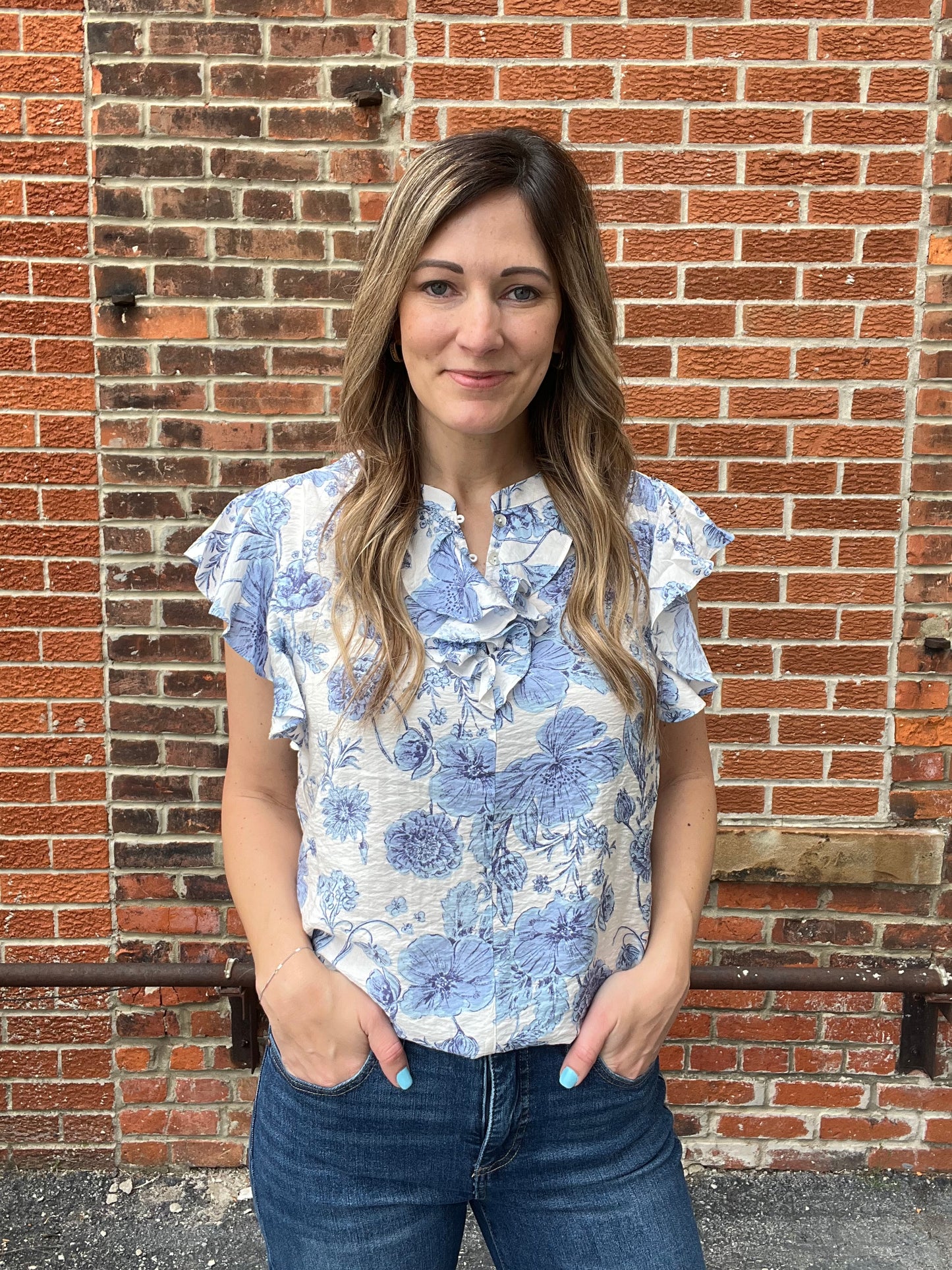 The Kaleigh Blue Floral Ruffle Blouse