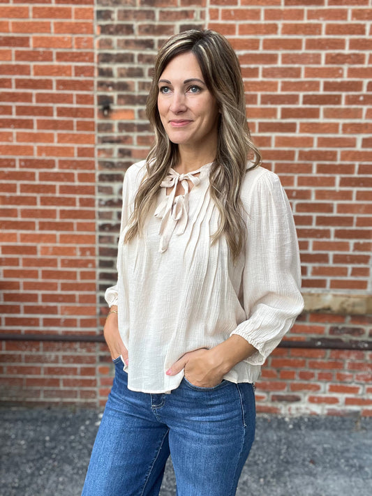 The Swayer Front Tie Pleated Top