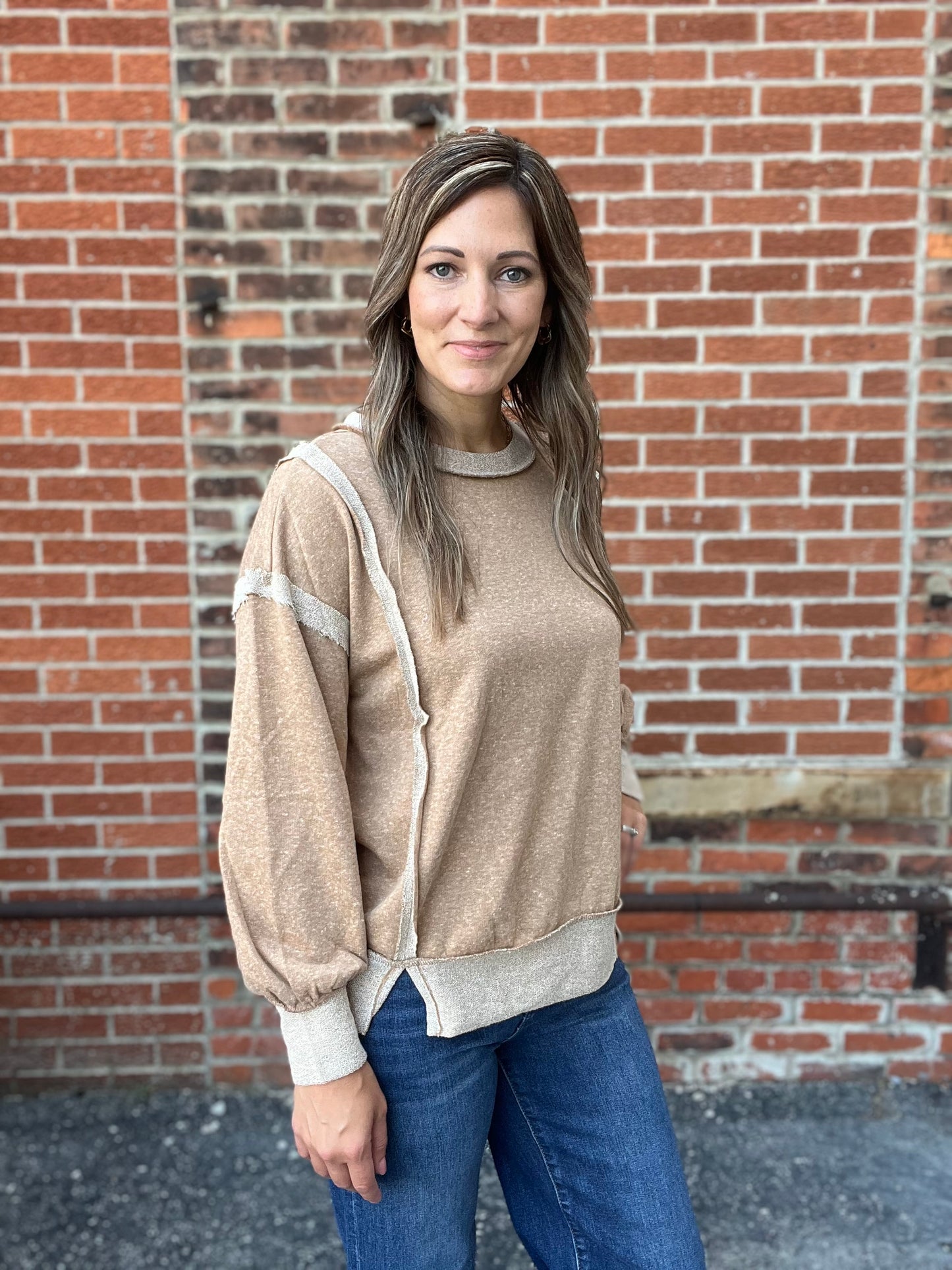 The Megara Exposed Seam long Sleeve Top