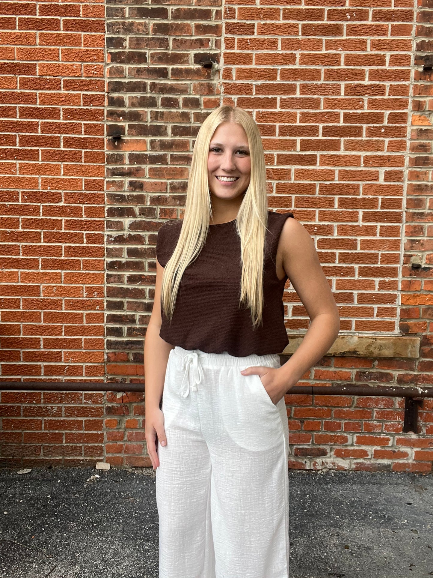 The Calyra Chocolate Bubble Hem Sleeveless Top