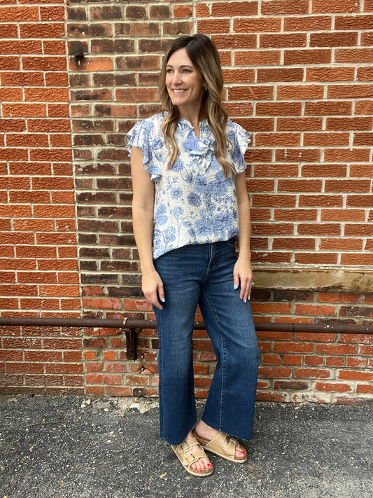 The Kaleigh Blue Floral Ruffle Blouse