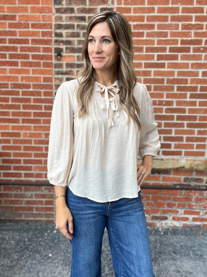 The Swayer Front Tie Pleated Top