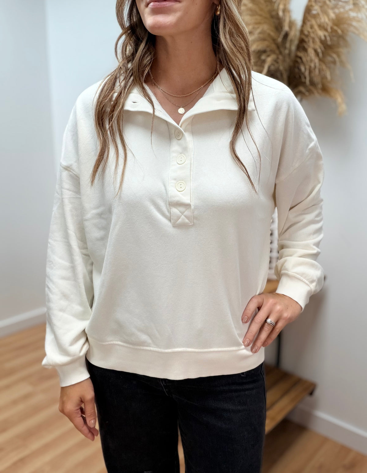 The Loloi Quarter Button Crewneck Sweatshirt