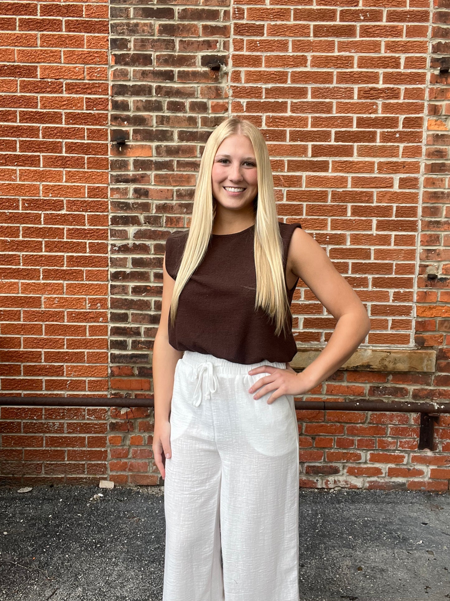 The Calyra Chocolate Bubble Hem Sleeveless Top