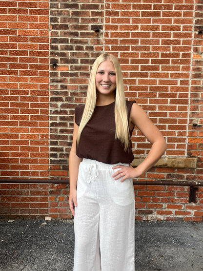 The Calyra Chocolate Bubble Hem Sleeveless Top