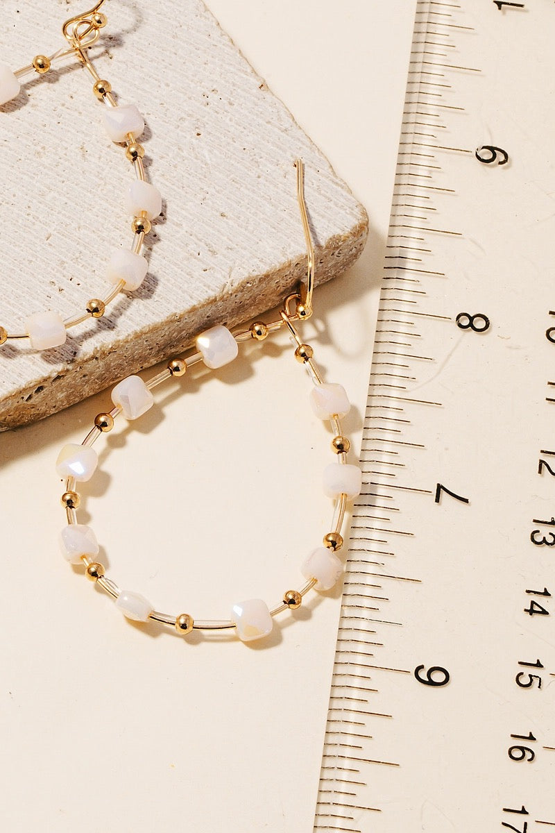 The Beaded Dangle Earrings