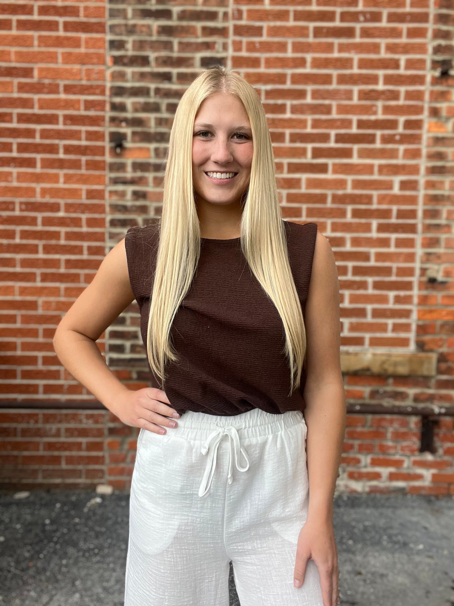The Calyra Chocolate Bubble Hem Sleeveless Top