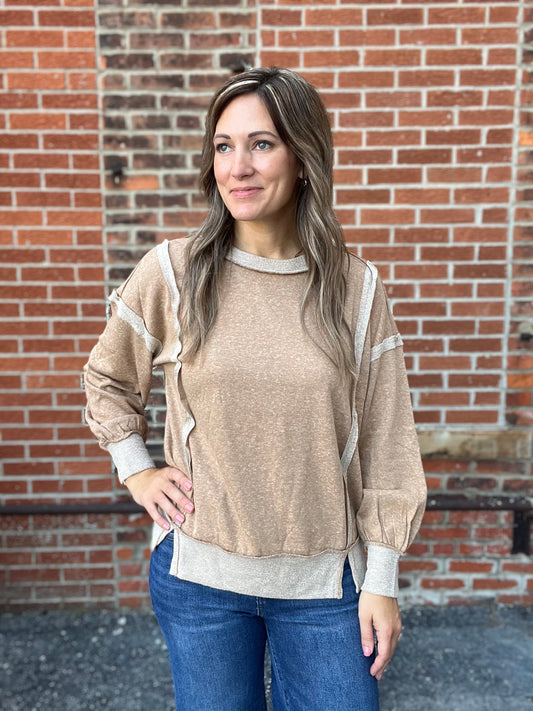 The Megara Exposed Seam long Sleeve Top