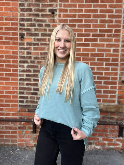 The Soren Dusty Blue Exposed Seam Knit Top